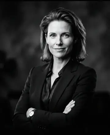 Alina Reyes, VP Growth, photographed in a dark studio portrait